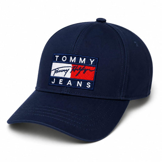 Embroidered Tommy baseball cap in blue side view 